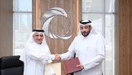 NCSA President Eng. Abdulrahman bin Ali Al Farahid Al Malki, and President of the Community College of Qatar, Dr. Khalid Mohammed Al Horr during the signing ceremony.
