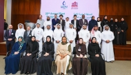 QatarEnergy LNG and Qatar University officials with winners of the Plant Design contest.