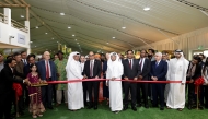 Representative of the Private Engineering Office Abdulrahman Mohammed Al Nuaimi and Ambassador of India to Qatar H E Vipul inaugurating the Indian Mango Festival yesterday in the presence of other guests.  Pic: Salim Matramkot/The Peninsula