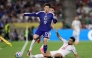 Tunisia's defender #21 Mohamed Ben Hamida kicks the ball out of the sidelines as Japan's forward #17 Yuito Suzuki jumps during the 2026 World Cup Group F football match between Tunisia and Japan at the Monterrey Stadium in Guadalupe, Mexico, on June 20, 2026. (Photo by Julio Cesar Aguilar / AFP)