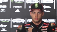 Team Aprilia Racing's Marco Bezzecchi is seen in the box during a free practice session prior to the MotoGP Grand Prix of Czechia in Brno, Czech Republic, on June 20, 2026. (Photo by Michal Cizek / AFP)