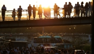 Music enthusiasts gather for free concerts on the banks of the Seine river during France's annual street music festival, the Fete de la Musique, in Paris on June 21, 2025. Photo by ROMAIN PERROCHEAU / AFP