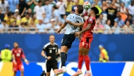 Uruguay's midfielder #08 Federico Valverde and Cape Verde's midfielder #06 Kevin Pina fight for the ball. (Photo by Chandan Khanna / AFP)
 