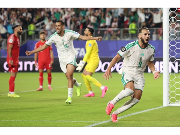 Amine Gouiri #9 of Algeria celebrates scoring his team's second goal during the FIFA World Cup 2026 Group J match between Jordan and Algeria at San Francisco Bay Area Stadium on June 22, 2026 in Santa Clara, California. Stu Forster/Getty Images/AFP 