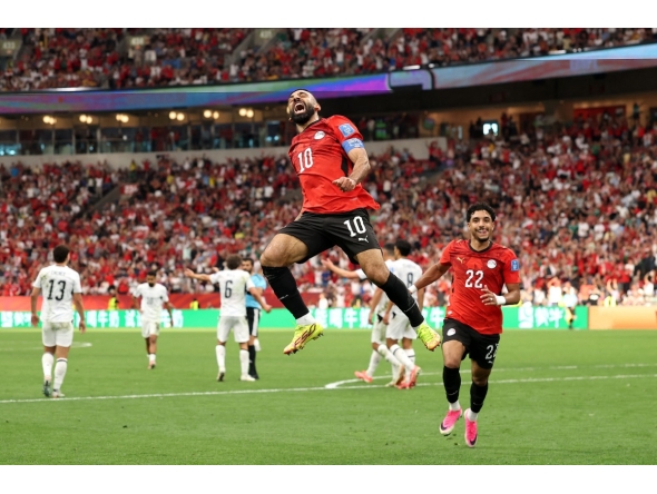 Mohamed Salah celebrates after scoring Egypt's second goal. (AFP)