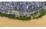 An aerial drone photo taken on June 22, 2026 shows the flood peak passing through the Liujiang River in Liuzhou, south China's Guangxi Zhuang Autonomous Region. (Photo by Li Hanchi/Xinhua)
