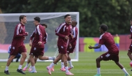 Qatar players in action during a training session. (AFP)