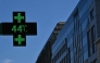 This photograph shows a pharmacy sign displaying the temperature of 44 degrees celsius in Brussels on June 23, 2026. (Photo by Nicolas Tucat / AFP)