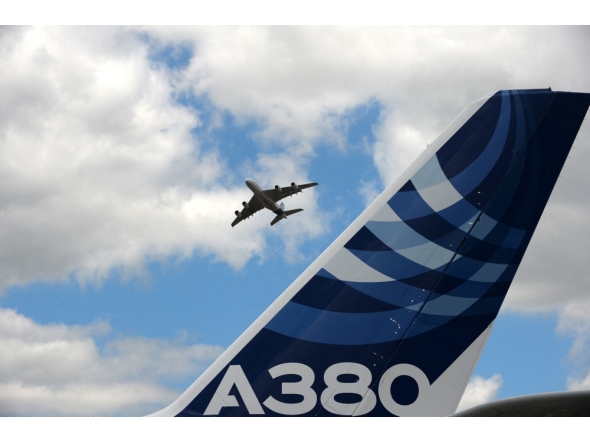 (FILES) An Airbus A380 performs a flying display at Le Bourget airport, near Paris, on June 24, 2017 during the public days the International Paris Air Show. (Photo by Eric Piermont/ AFP)
