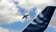 (FILES) An Airbus A380 performs a flying display at Le Bourget airport, near Paris, on June 24, 2017 during the public days the International Paris Air Show. (Photo by Eric Piermont/ AFP)