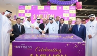 President of the Central Municipal Council Mohammed bin Ali Al-Athbah, Chairman of Lulu Group Yusuffali M A, Lulu Global Operations Director & Chief Sustainability Officer Dr. Mohamed Althaf with officials and guests during the cake cutting event.