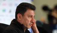 Amir Ghalenoei, head coach of Iran, listens to a question during a press conference one day ahead of the FIFA World Cup 2026 Group G match between Egypt and Iran at Seattle Stadium. Photo by Soobum ImAFP 