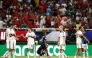 Spain's players celebrate after winning the 2026 World Cup Group H football match between Uruguay and Spain at the Guadalajara Stadium in Zapopan on June 26, 2026. (Photo by Ulises Ruiz / AFP)