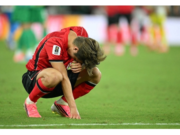 South Korea's midfielder #19 Lee Kang-in reacts after his team lost the 2026 World Cup Group A football match between South Africa and South Korea at the Monterrey Stadium in Guadalupe, Mexico, on June 24, 2026. (Photo by Yuri CORTEZ / AFP)

