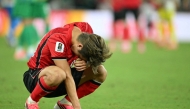 South Korea's midfielder #19 Lee Kang-in reacts after his team lost the 2026 World Cup Group A football match between South Africa and South Korea at the Monterrey Stadium in Guadalupe, Mexico, on June 24, 2026. (Photo by Yuri CORTEZ / AFP)
