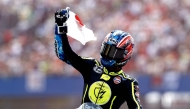 Japan's Ai Ogura reacts on his Aprilia after the MotoGP race during the 95th edition of the Dutch Motorcycle Grand Prix at the TT Circuit Assen, in Assen, on June 28, 2026. (Photo by Vincent Jannink / ANP / AFP) 