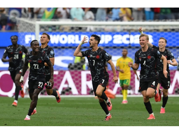 Canada's midfielder #07 Stephen Eustaquio celebrates scoring his team's first goal during the 2026 World Cup round of 32 football match between South Africa and Canada at the Los Angeles Stadium in Inglewood on June 28, 2026. (Photo by Patrick T. Fallon / AFP)