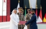 Deputy Prime Minister and Minister of State for Defence Affairs H E Sheikh Saoud bin Abdulrahman bin Hassan Al-Thani honouring a graduate during the ceremony. 
