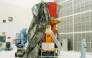 This handout photo released by NASA on July 31, 2004, shows the Swift spacecraft being unwrapped in Hangar AE at Cape Canaveral Air Force Station at Kennedy Space Center, Florida. (Photo by Handout / NASA / AFP) 