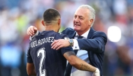 Gustavo Alfaro, Head Coach of Paraguay, embraces Gustavo Velazquez #2 after the penalty shootout win during the FIFA World Cup 2026 Round Of 32 match between Germany and Paraguay at Boston Stadium on June 29, 2026 in Foxborough, Massachusetts. (Photo by ROBERT CIANFLONE / GETTY IMAGES NORTH AMERICA / Getty Images via AFP)