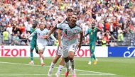Youri Tielemans #8 of Belgium celebrates scoring his team's third goal from the penalty spot during the FIFA World Cup 2026 Round Of 32 match between Belgium and Senegal at Seattle Stadium on July 01, 2026 in Seattle, Washington. (Photo by ALEX GRIMM / GETTY IMAGES NORTH AMERICA / Getty Images via AFP)