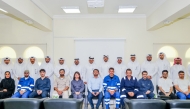 Undersecretary for Public Services Affairs at the Ministry of Municipality Eng. Abdullah bin Ahmed Al Karani with other officials and students during the event.