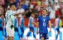 Croatia's midfielder #10 Luka Modric reacts next to Portugal's forward #07 Cristiano Ronaldo on July 2, 2026. (Photo by Kamil Krzaczynski / AFP)