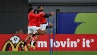 Egypt's Mohamed Salah (right) takes part in a training session with teammates.