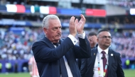Gustavo Alfaro, Head Coach of Paraguay, applauds fans after the 0-1 loss during the FIFA World Cup 2026 Round of 16 match between Paraguay and France at Philadelphia Stadium  (Photo by Buda Mendes / AFP)