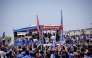Cape Verde players greet supporters from a bus upon their arrival in Praia, yesterday.