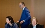 German Chancellor Friedrich Merz walks past German Minister for Research, Technology and Aerospace Dorothee Baer (front L) and German Minister for Labour and Social Affairs Baerbel Bas prior to the weekly cabinet meeting at the Chancellery in Berlin, Germany, on July 6, 2026. (Photo by John MACDOUGALL / AFP)