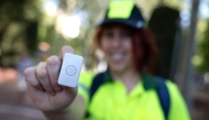 A picture taken on July 6, 2026 in Barcelona shows a gardener's wristband containing a sensor that detects body temperature. (Photo by Josep Lago / AFP)