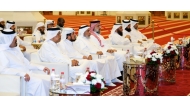 Minister of Awqaf and Islamic Affairs H E Ghanem bin Shaheen bin Ghanem Al Ghanim with other officials during the event.