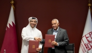 Assistant Secretary-General for Future Foresight and National Visions Center at the National Planning Council Bassam Issa Al Mannai and President of the Doha Institute for Graduate Studies Dr. Abdelwahab El-Affendi during the signing of the MoU. 
