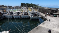 Fishing boats are secured at Shen'ao Harbour ahead of the arrival of Typhoon Bavi, in New Taipei City on July 9, 2026. (Photo by I-Hwa Cheng / AFP)