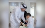 Prime Minister and Minister of Foreign Affairs H E Sheikh Mohammed bin Abdulrahman bin Jassim Al-Thani with a child. Picture shared by the Education Minister in a social media post.  