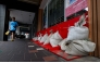 Sandbags are stacked outside a building ahead of the arrival of Typhoon Bavi in Keelung on July 10, 2026 (Photo by I-Hwa Cheng / AFP)
 