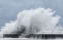 Strong waves break along the coast in Yilan on July 10, 2026, as Typhoon Bavi moves toward Northeastern Taiwan. (Photo by I-Hwa Cheng / AFP)