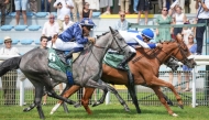 Fakhira (front) with Christophe Soumillon in the saddle competes during the 1900m race. 