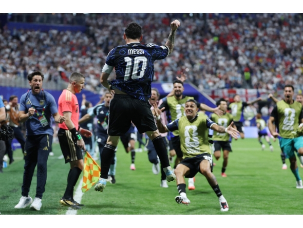 Argentina's forward #10 Lionel Messi celebrates his team's second goal scored by Argentina's forward #22 Lautaro Martinez (out of frame) during the 2026 World Cup football tournament semi-final match between England and Argentina at the Atlanta Stadium in Atlanta on July 15, 2026. (Photo by Thomas COEX / AFP)
