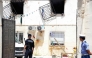 Police officers stand guard at the entrance of an orphanage following a fire in the Mohammadia suburb of Algiers on July 16, 2026 (Photo by AFP)