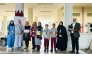 Officials and students during the ceremony.