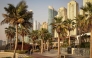 People walk through the Jumeirah Beach Residence (JBR) district in Dubai on July 21, 2026. (Photo by Fadel Senna / AFP)  