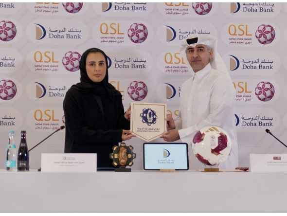  Executive Director of Sales, Marketing and Communication at QSL Hassan Rabiah Al Kuwari and Head of Marketing and Public Relations, Doha Bank, Al Anoud Khalid Al Attiyah during the partnership signing ceremony.