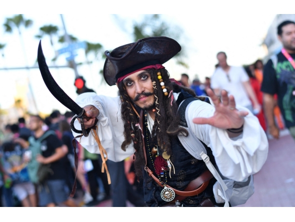 A Jack Sparrow pirate cosplayer poses outside the Convention Center during Comic Con International in San Diego on July 23, 2026. (Photo by Chris Delmas / AFP)