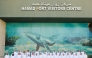 Officials and students at Hamad Port Visitors Centre. 