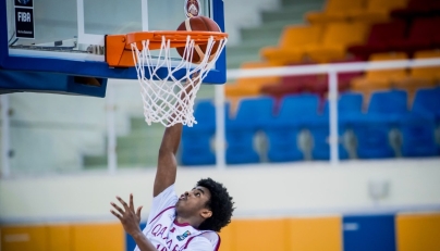 Qatar's Abdullah Yassin goes for a basket