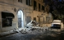 This photograph shows a car crushed by rubble after a magnitude 4.7 earthquake struck the Campi Flegrei area in Pozzuoli, near Naples on July 31, 2026. (Photo by Felice DE MARTINO / ANSA / AFP) /