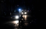 A man rides his bicycle down a street during a blackout in Havana on August 1, 2026. (Photo by Yamil Lage / AFP)