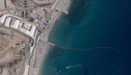 This handout satellite photograph, taken on August 2, 2026, and released by Planet Labs PBC, shows the waterline marking the Spain-Morocco maritime border off Spain's North African enclave of Ceuta. Photo by Handout / 2026 Planet Labs PBC / AFP